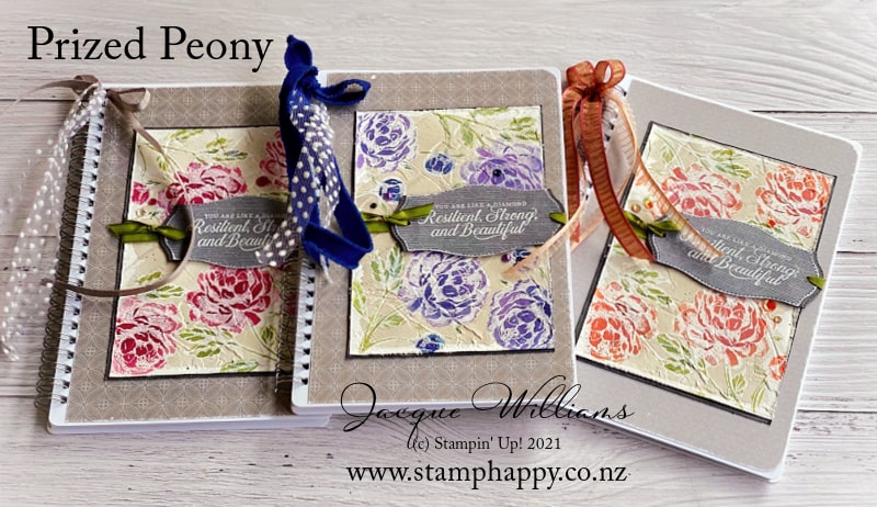Create personalized and unique gifts by altering notebooks with the Prized Peony stamp set and the emboss resist technique.  Jacque Williams as StampHappy in New Zealand for craft classes and inspiration