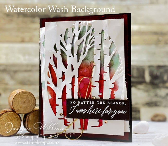 Create a smooth watercolor wash for a unique background behind the Aspen Tree Dies (Perched in a Tree bundle).  Great for sympathy or Christmas cards with Jacque Williams