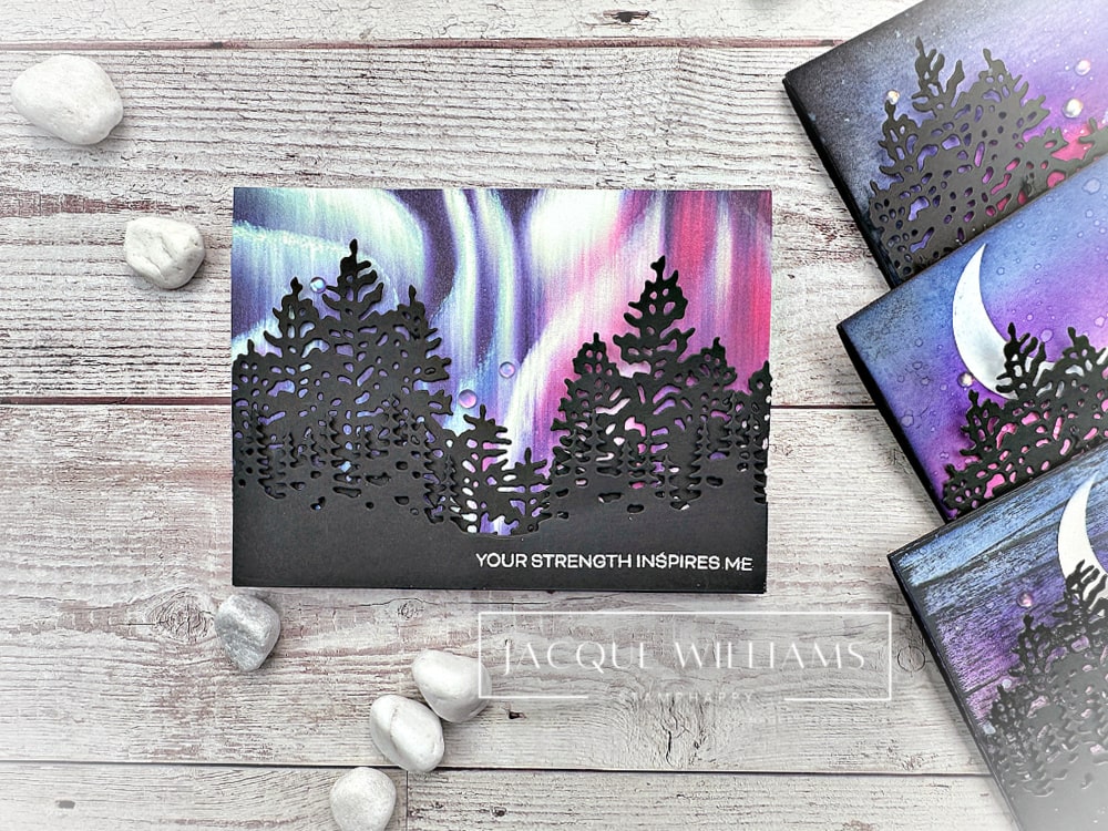 Four handmade card projects featuring night sky backgrounds created with the Stampin’ Up! Light & Wonder stamp and die set. Each card uses the same colour palette and layout but showcases a different sky technique.  with Jacque Williams - StampHappy